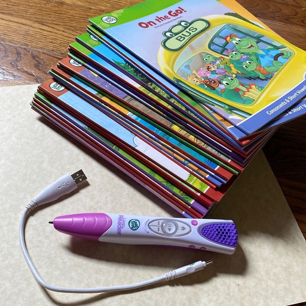 Leap frog reader. Good condition pen with extra reading books. Cable includes.